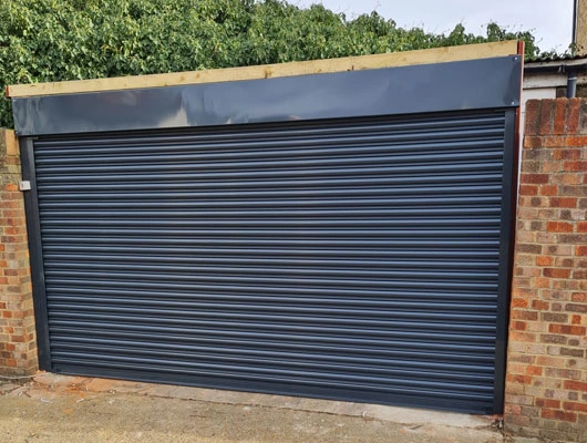 Secure grey roller shutter on a retail store